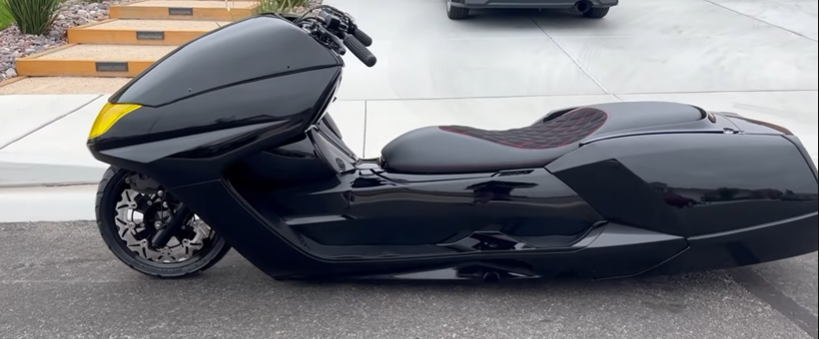 Black custom GILMADE scooter